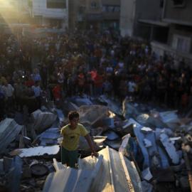Photo: A Palestinian child amid the destruction caused by Israel’s military assault on Gaza. (Credit: Mohammed Zaanoun).